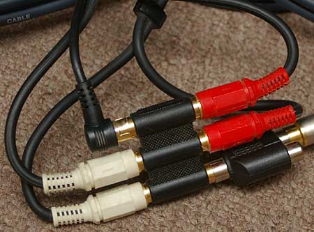 The red and the white plugs are the ends of a quarter century old cable